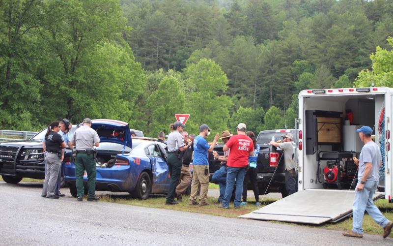 Megan Broome/The Clayton Tribune. Georgia State Patrol, Georgia Department of Natural Resources, Rabun County Sheriff’s Office, Tallulah Falls Police Department, Rabun County EMA, Georgia Department of Corrections K-9 Unit, Georgia Emergency Management Agency, Rabun County EMS, Rabun County Coroner and the Habersham County Sheriff’s Office responded to a scene near the Tallulah River Monday where a suspect fled on foot following a traffic stop by GSP earlier that morning. 