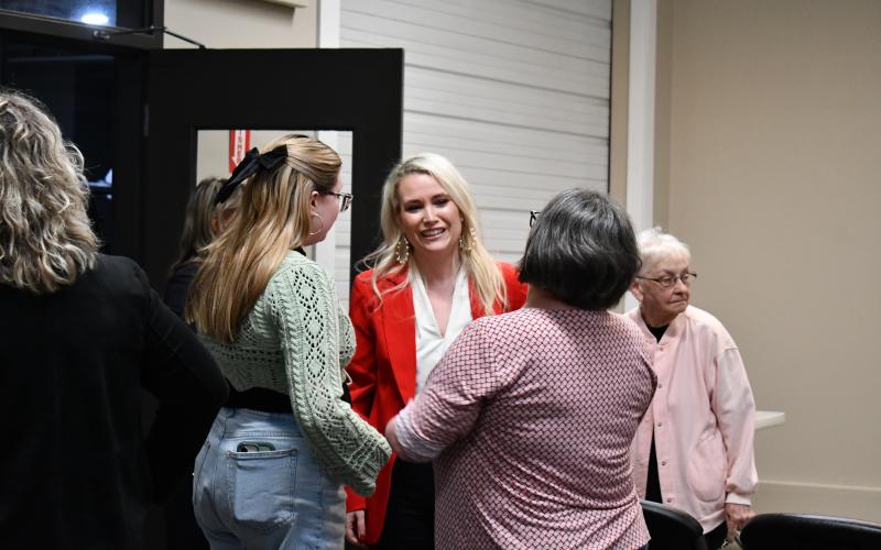 Megan Horn/The Clayton Tribune. Lauren James Messer, who is running for Rabun County Clerk of Superior Court, converses with audience members during the April 11 forum.