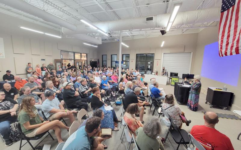 Enoch Autry/The Clayton Tribune. A total of 225 paid for Rabun County’s first-ever World UFO Conference that was held at the Food Bank of Northeast Georgia on June 29. Below: Those in attendance even donned springy antenna to salute the visitors from afar.